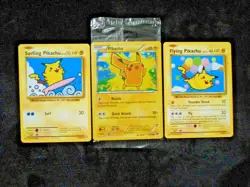 Sealed Pikachu 2014 Movie Holo 42/146 + Surfing Flying 110-111 Pokemon Card Lot - Image 1