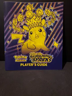 POKEMON SCARLET & VIOLET SURGING SPARKS ELITE TRAINER BOX PLAYER'S GUIDE - Image 1