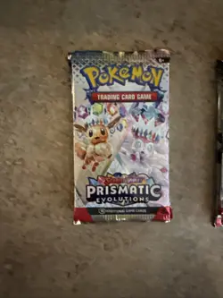 Pokemon Prismatic Evolutions Booster Pack Single Sealed Booster - Image 1