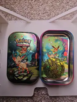 Leafeon Prismatic Evolutions Mini Tin with Art Card and Coin Empty - Image 1
