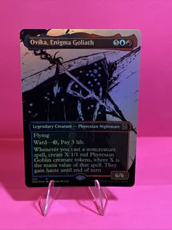 Ovika, Enigma Goliath (Showcase) Phyrexia: All Will Be One Foil - Image 1