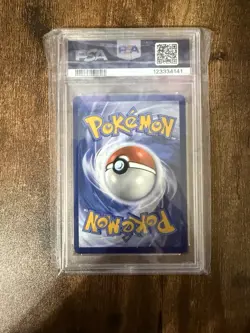 Team Rocket's Tyranitar (Pokemon Center Exclusive) PSA 10 - Image 2