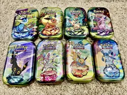 Pokemon TCG Prismatic Evolutions Mini Tin Complete Set - 8 Factory Sealed Tins - Image 1