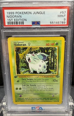 1999 POKEMON JUNGLE NIDORAN 1ST EDITION #57 PSA 9 - Image 1