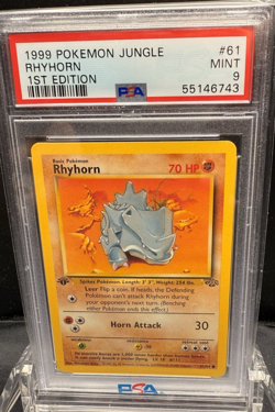 1999 POKEMON JUNGLE RHYHORN 1ST EDITION #61 PSA 9 - Image 1
