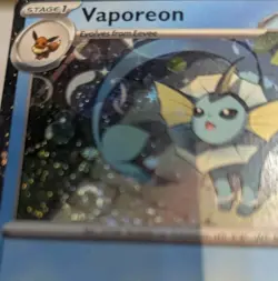 Vaporeon SVP 168 Black Star Promo TCG Pokemon Card Double Swirl Cosmos Holo - Image 3