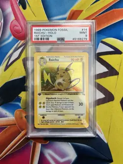 PSA 9 Raichu 14/62 1st Edition Fossil Holo Pokemon Card - Image 1