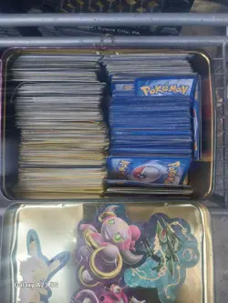 Pokemon Tin Full Of Random Cards - Image 1