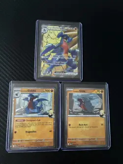 Pokemon TCG Cynthia’s Garchomp SVP 204 Black Star Promo Gible and Gabite. - Image 1