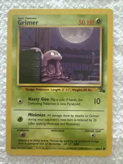 1st Edition Grimer 48/62 Common 1999 Fossil Set WOTC Pokemon Card - Image 1