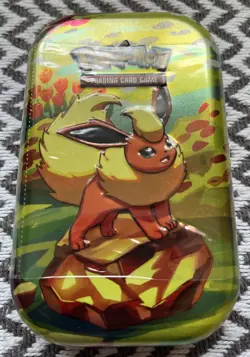 Pokemon Scarlet & Violet Prismatic Evolutions Mini Tin Flareon New Sealed💥 - Image 1