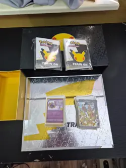 121 Total Pokemon Celebrations Card Lot With Elite Trainer Box And Card Holders - Image 1
