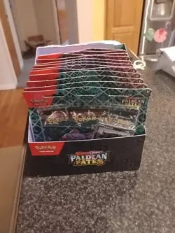 Pokemon TCG Paldean Fates Tech Sticker Collection Display (12 Blister, 36 Packs) - Image 1