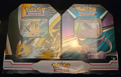 2 Tin Set Jolteon Sylveon Target V Heroes Sealed Pokemon TCG - Image 1