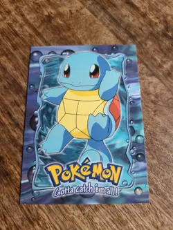 1999 Topps Pokemon Squirtle #07 Stage 2 E7 of 12 Black Logo First Movie Card - Image 1