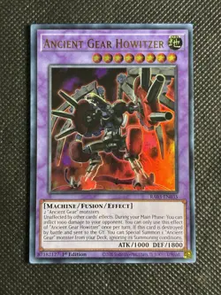 YuGiOh! - Ancient Gear Howitzer RA03-EN035 Ultra Rare 1st Edition Near Mint - Image 1