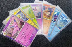 Pokemon Prismatic Evolutions Cosmos Promo 7 Card Set - Image 1