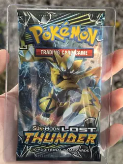Pokemon Sun and Moon Lost Thunder Sealed Booster Pack - Random Pack Art - Image 1