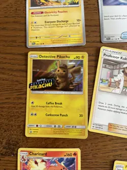 26 Pokemon Cards Including Detective Pikachu, Cetitan,and Trainer Cheryl - Image 4