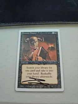 Demonic Tutor Revised Edition Regular SIGNED BY DOUGLAS SHULER - Image 1