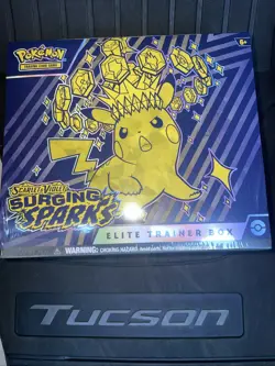 Pokemon TCG Surging Sparks etb only box and dice and sleeves - Image 1