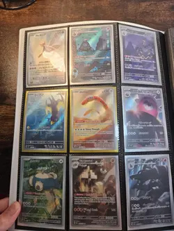 13.5 page binder of Holo/Foil Pokemon Cards - Image 2