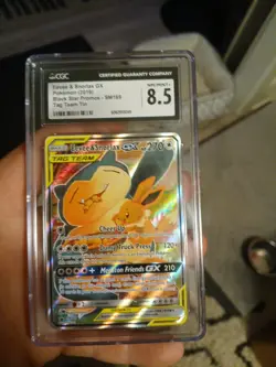 CGC 8.5 Eevee & Snorlax GX Black Star Promos SM169 Tag Team Tin Pokemon Card - Image 1