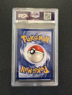 1999 Pokemon Fossil 1st Edition Dragonite Holo Card #4/62 PSA 7 - Image 2