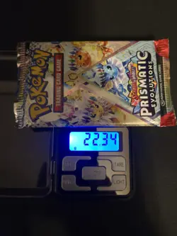 Pokemon TCG Prismatic Evolutions Booster Pack NEW SEALED HEAVY 22.34 GRAMS - Image 1
