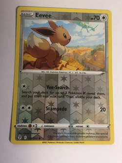 Pokemon Card Evolving Skies Reverse Holographic Eevee 125/203 NM - Image 1