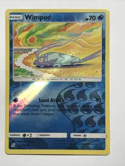 Pokemon Unified Minds Wimpod 50/236 Reverse Holo Common - Excellent Condition - Image 1