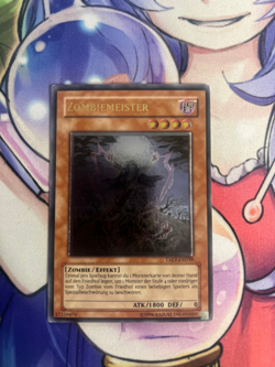 ZOMBIE MASTER ULTIMATE RARE GERMAN TAEV-EN039 DE039 LIGHT PLAY YUGIOH - Image 1