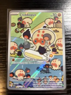 Pokemon TCG: Surging Sparks: 207/191 Clobbopus Illustration Rare (NM) - Image 2