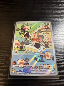 Pokemon TCG: Surging Sparks: 207/191 Clobbopus Illustration Rare (NM) - Image 3