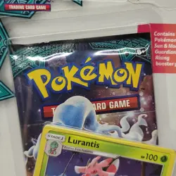2017 Sun & Moon Guardians Rising sealed 1 booster pack Pokemon TCG Lurantis coin - Image 3
