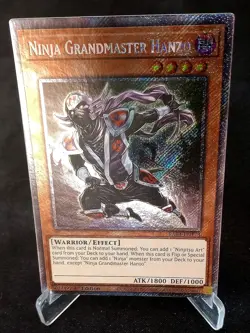 YuGiOh! Ninja Grandmaster Hanzo RA04-EN173 Platinum Secret Rare - Near Mint/Mint - Image 1