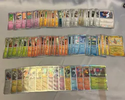 Surging Sparks Lot Of 100+ Cards Pokemon TCG Common / Uncommon Trading Card - Image 1