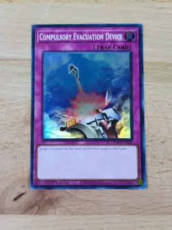 Compulsory Evacuation Device 1st Edition Platinum Super Rare RA01-EN069 Yugioh - Image 1