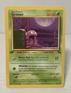 1st Edition Fossil Grimer 48/62 Pokemon Card WOTC Vintage LP - Image 1
