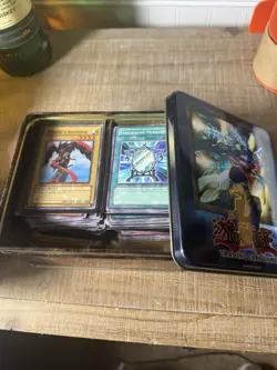 Yu-Gi-Oh! Kaiba Tin Lot - 200 Cards + 1st Ed Thousand Dragon, Time Wizard - Image 1