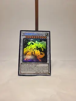 Shooting Star Dragon 1st Edition Ghost Rare CGC 8 2010 STBL-EN040 Yu-Gi-Oh! Card - Image 1