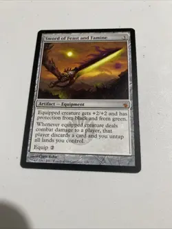 Sword of Feast and Famine Mirrodin Besieged Regular-138- - Image 1