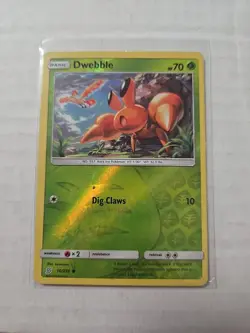 Pokemon TCG Dwebble 10/236 Sun Moon Unified Minds Reverse Holo - Image 1