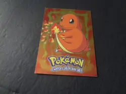 1999 Topps Pokemon the First Movie E4 #04 Charmander Silver Foil Black Logo - Image 1
