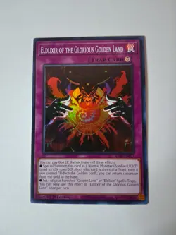 2025 Yugioh Eldlixir Of The Glorious Golden Land Trap Card ALIN-EN077 Super Rare - Image 1