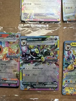 Prismatic Evolutions Surprise Box Sealed Stamped EX Promo Cards 10 Cards - Image 2