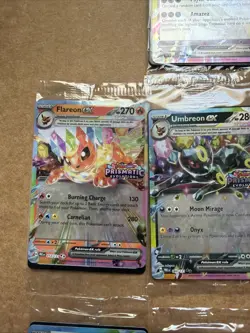 Prismatic Evolutions Surprise Box Sealed Stamped EX Promo Cards 10 Cards - Image 4