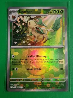 Pokemon TCG SV-Prismatic Evolutions Leafeon #5/131 Rare Poke Ball - Image 1