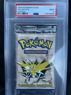 1999 POKEMON 1ST EDITION FOSSIL BOOSTER PACK ZAPDOS ART PSA 9 - Image 1