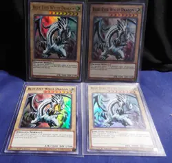 (4) Blue-Eyes White Dragon LDS2-EN001 1st Ed (Grn,Pur,Blu,Gld) - Yugioh Card NM - Image 1
